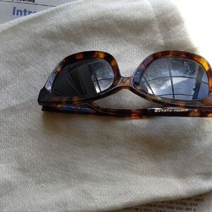 Warby Parker Women’s Tortoiseshell Round Sunglasses with Dark Lenses